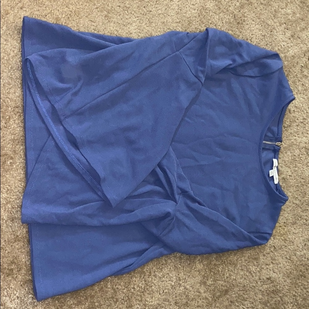 A blue blouse with long sleeves 💙